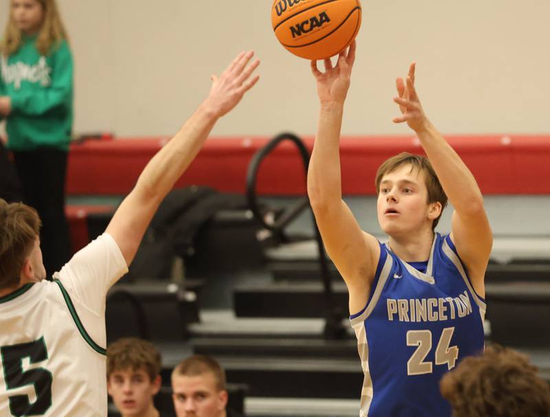 Princeton's Ryan Jagers lets go of a jump shot over Eureka's Grant Roberts during the Colmone Classic on Thursday, Dec. 11, 2025 at Hall High School.