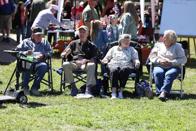 Rich Bredenkamp, center, and his wife Jackie drove from Omaha, Nebraska to attend the 11th Annual Operation Firm Handshake Veteran’s Picnic with his former Army mate Bill Wills, from Coal City, and his wife Patti on Saturday, Sept. 7, 2024 in Coal City.