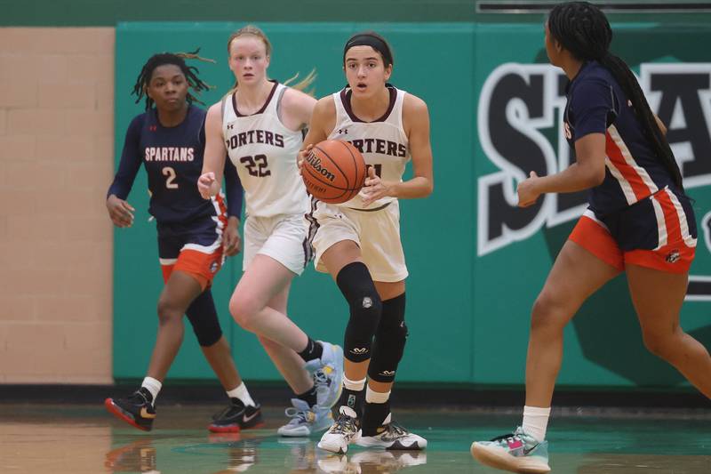 Lockport’s Katie Peetz looks to pass after the rebound Romeoville in the Oak Lawn Holiday Tournament championship on Saturday, Dec.16th in Oak Lawn.