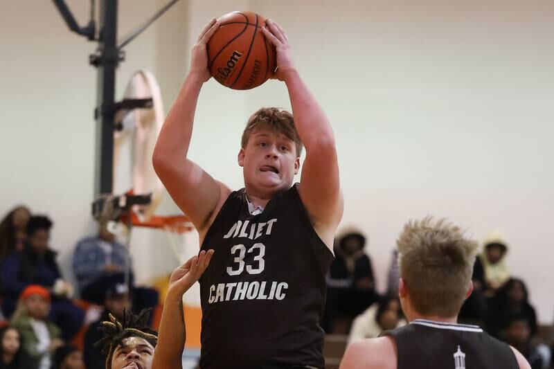 Joliet Catholic’s Anthony Birsa pulls in a rebound against Prespectives in the Class 2A Julian Sectional championship on Friday, March 3rd, 2023 in Chicago.