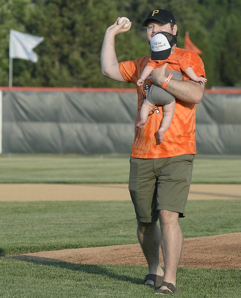 Illinois Valley Pistol Shrimp fan Holden Harlow was selected to throw out the first pitch with his son Hudson not bearing to look Friday, June 2, 2023, at Schweickert Stadium at Veterans Park in Peru.