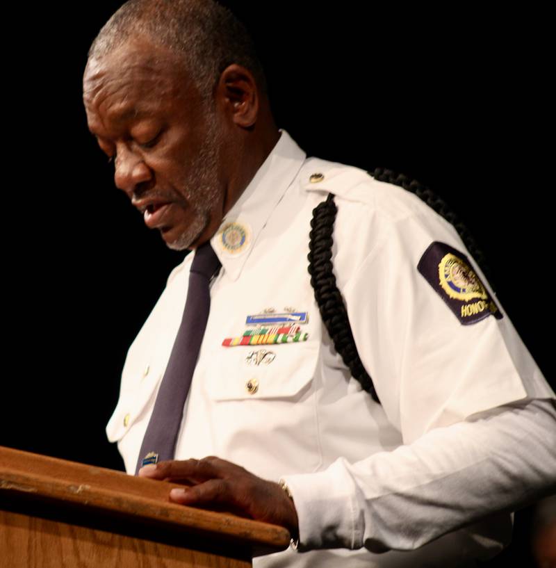 Gordon Harris, chaplain for Sterling American Legion Post 296, provides the invocation during a Veterans Day ceremony Friday, Nov. 11, 2022 at Sterling High School Centennial Auditorium.