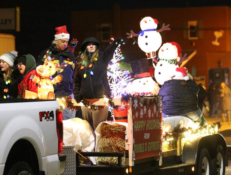 The Double D Express float rolls down Peoria Street during the Light up the Night parade on Saturday, Dec. 3, 2022 downtown Peru.