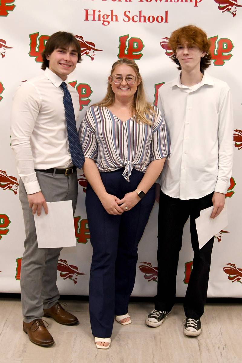 Gage Swiskowski (left) and Jacob Maier (right) received Financial Plus Credit Union Scholarships, presented by Crystal Geiger (middle). These $500 scholarships are awarded to local high school graduates who are Financial Plus members pursuing higher education.