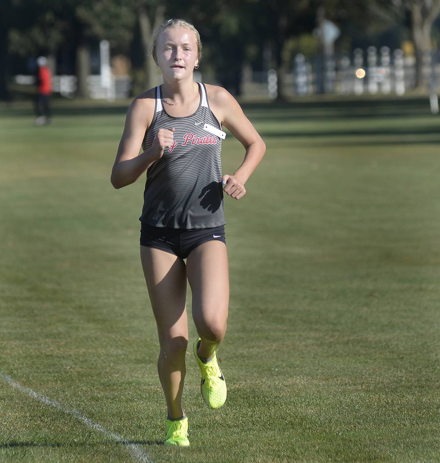 Ottawa's Grace Carroll finishes her second-place run Saturday, Oct. 1, 2022, during the La Salle County Invitational at The Eastwood in Streator.
