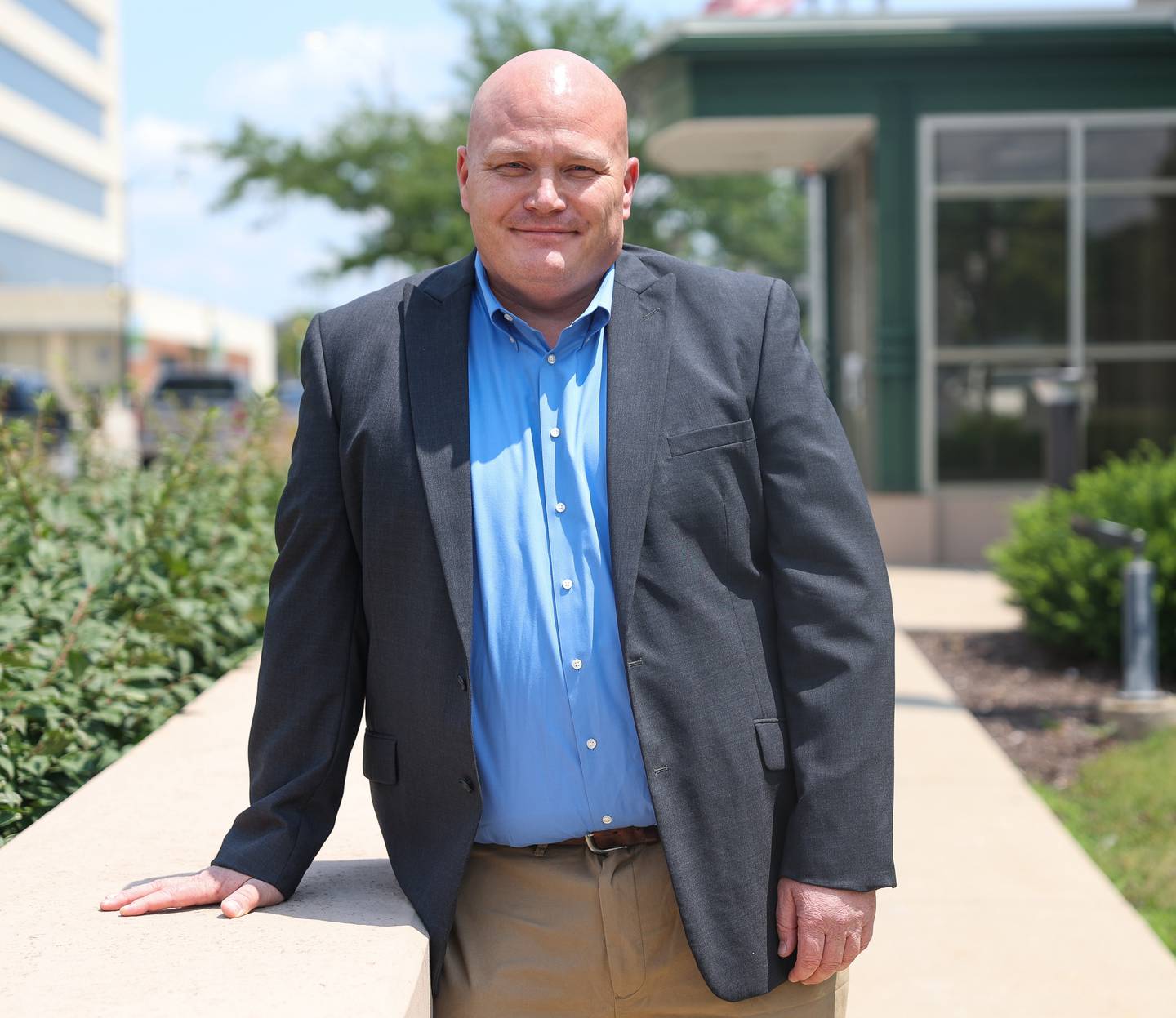 Joliet Police Sergeant Dwayne English poses for a photo outside the Joliet Police Department on Thursday, July 11, 2024. English is also a practicing pre-licensed professional counselor.