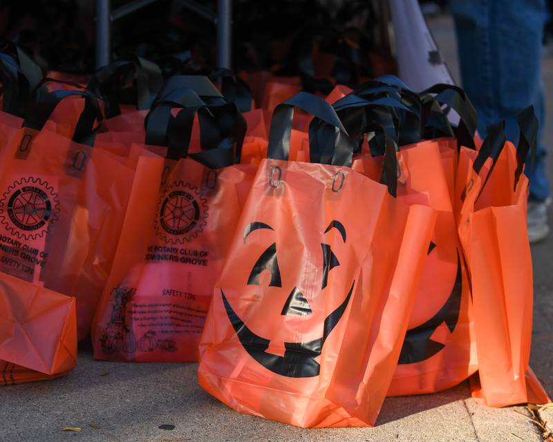 Goodie bags that included paint supply’s wait to be handed out to participants on Saturday Oct. 26, 2024, to paint downtown Downers Grove windows.