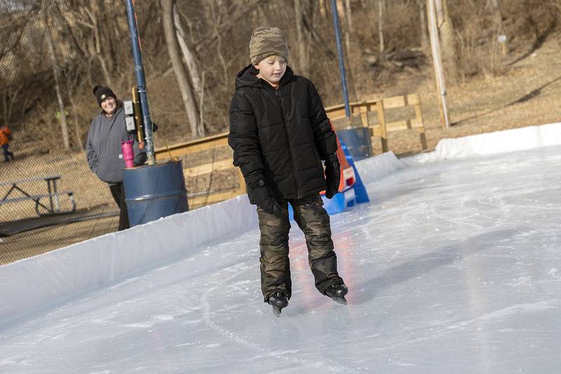 Tian Miller works around the rink Saturday, Jan. 11, 2025, at Page Park in Dixon.