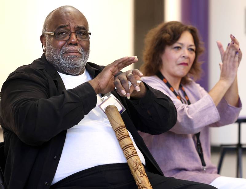 DeKalb School District 428 Superintendent Minerva Garcia-Sanchez and Leroy Mitchell applaud Friday, Aug. 8, 2025, during the grand opening celebration for the school that bears his name, Dr. Leroy A. Mitchell Elementary School in DeKalb.