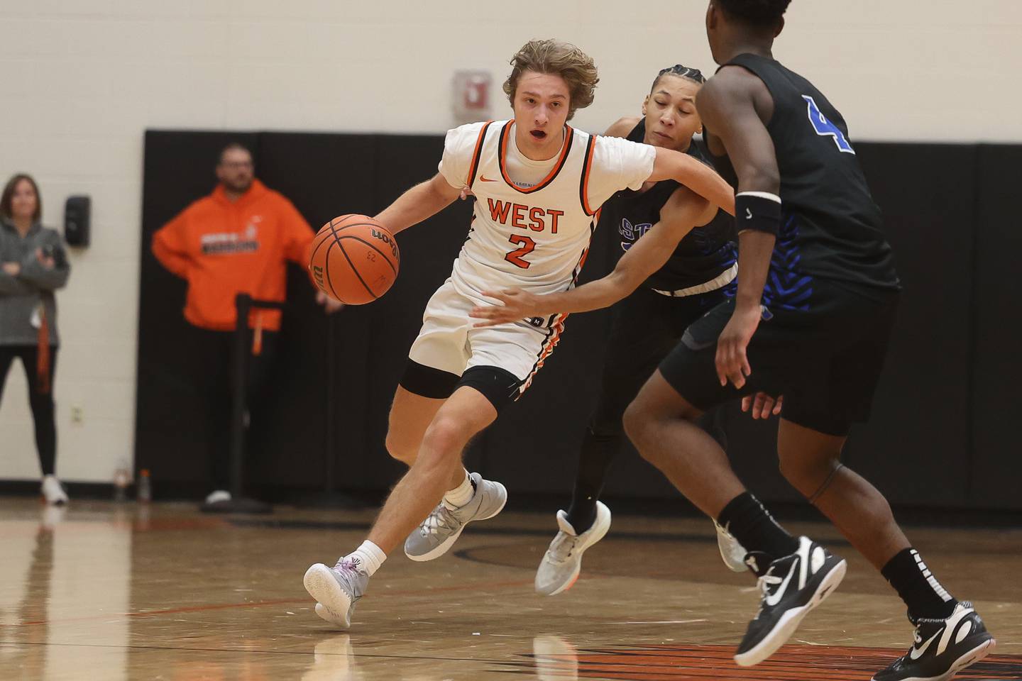 Lincoln-Way West’s Eli Bach draws a could heading upcourt against Lincoln-Way East on Tuesday, Jan. 16th, 2024 in New Lenox.