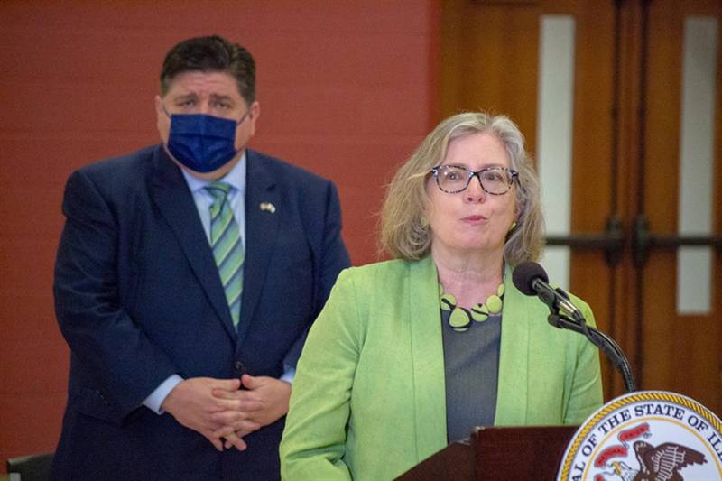 Gov. JB Pritzker and Illinois Housing Development Authority Executive Director Kristin Faust are pictured at a housing-related news conference in Springfield.