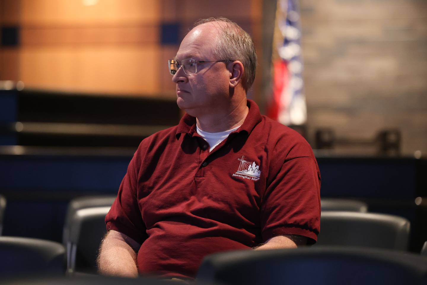 MorningStar Mission representative Kevin Watson sits in on the City of Joliet Zoning Board of Appeals Meeting. Thursday, May 19 2022, in Joliet.