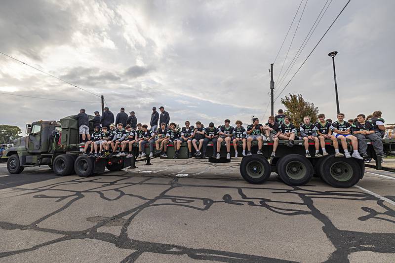 The Rock Falls football team rides through the homecoming parade Thursday, Sept. 21, 2023. The Rockets will take on the Rockford Christian Royal Lions on Friday.