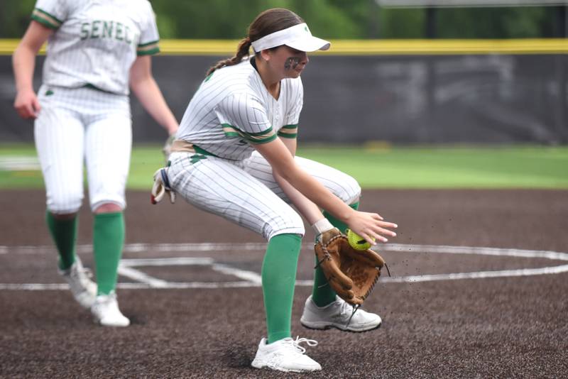 Seneca's Kaylee Klinker fields a bunt during the Class 2A Seneca Sectional championship against Beecher Friday, May 30, 2025.