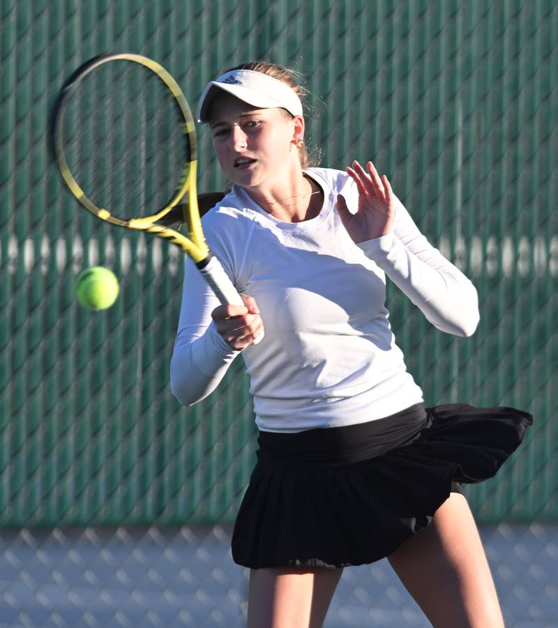 Fenwick’s Lily Brecknock returns the ball during the Class 2A during third-place singles match of the girls state tennis tournament at Hersey High School on Saturday, Oct. 26, 2024 in Arlington Heights.