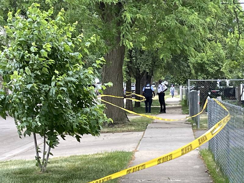 Officers in the 500 block of East Benton Street on Tuesday, June 6, 2023 in Joliet. A 20-year-old man was shot in the head and died the same day.