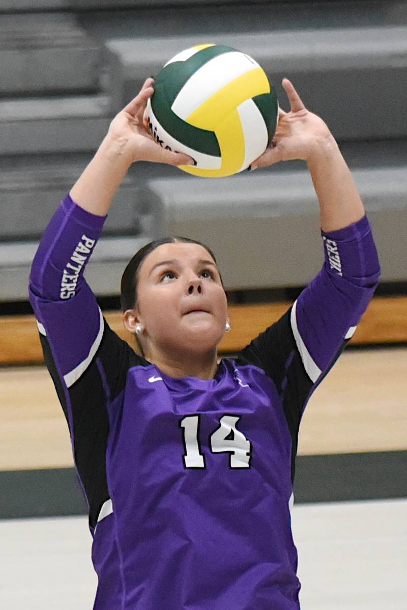 Manteno's Danika Fletcher sets the ball during a game at Bishop McNamara Monday, Oct. 20, 2025.