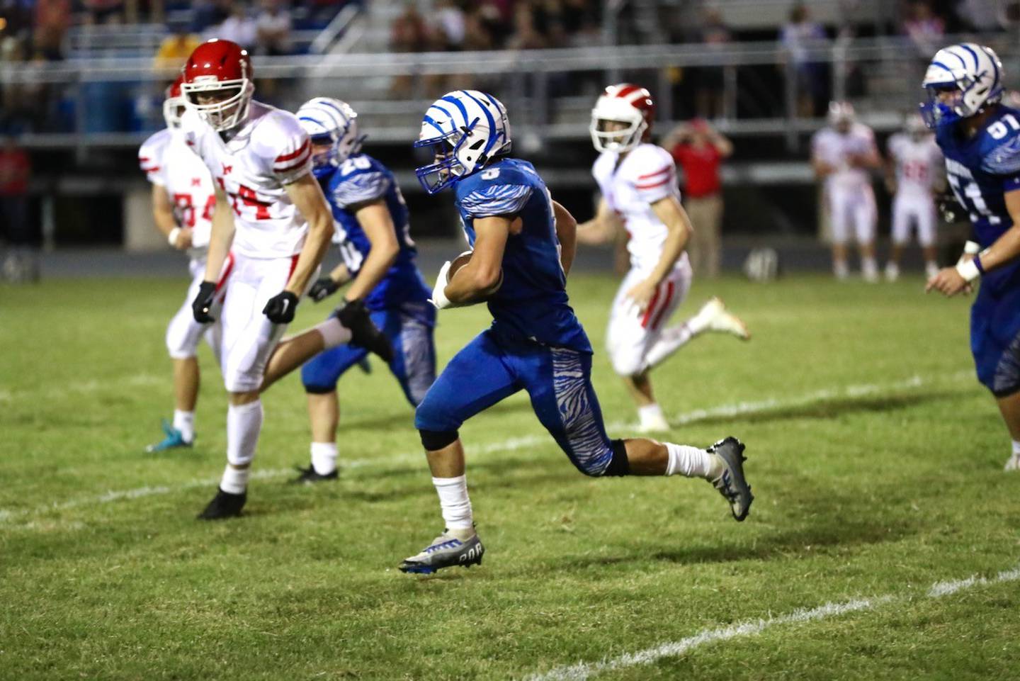 Princeton's Ace Christiansen races for a run against Morrison Friday night at Bryant Field.