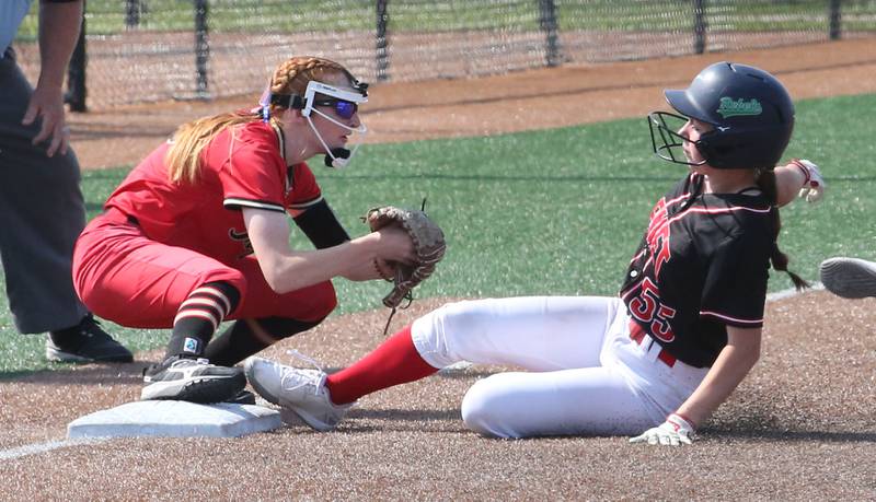 Charleston's third baseman Avery Beals forces out Benet Academy's Hannah Baer during the Class 3A State third place game on Saturday, June 10, 2023 at the Louisville Slugger Sports Complex in Peoria.
