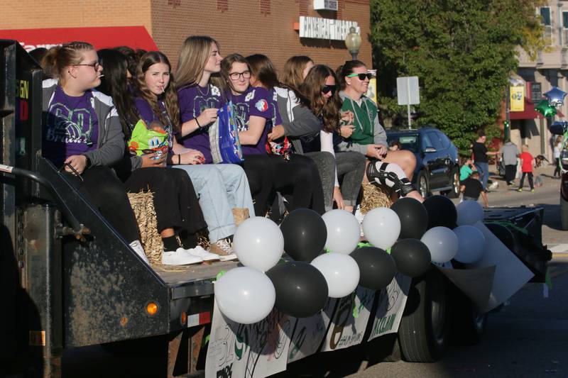 St. Bede volleball players ride in the Homecoming parade on Friday, Sept. 30, 2022 downtown Peru.