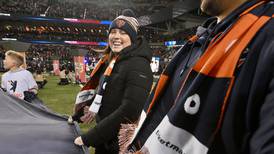 Crystal Lake woman diagnosed with breast cancer at 30 unfurls Bear Down flag before Chicago Bears OT win