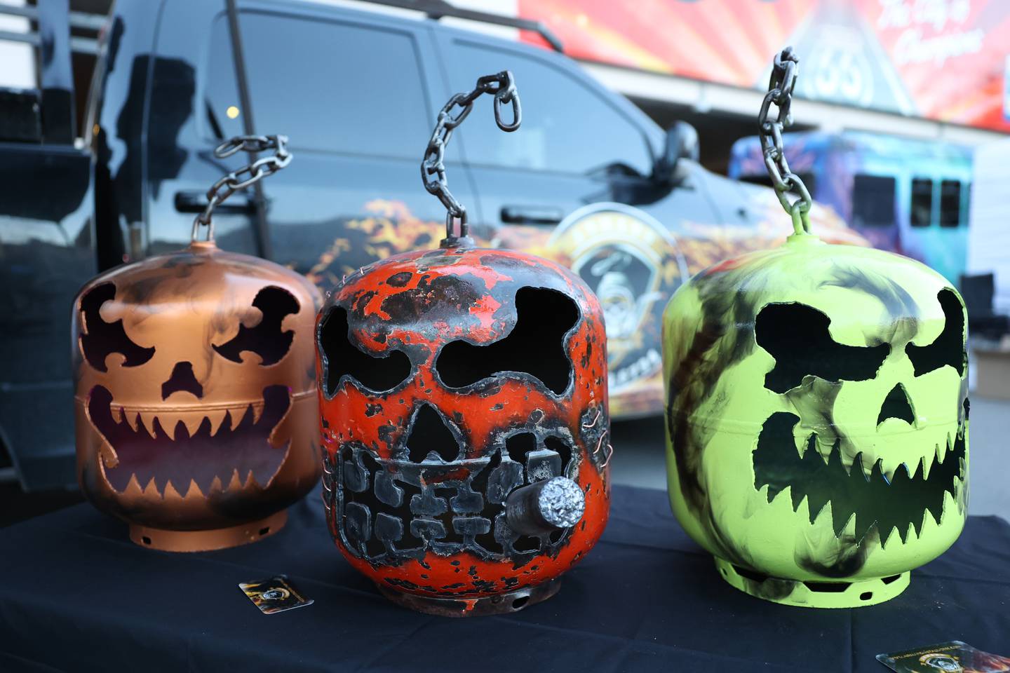 Armand Metal Works sells pumpkins art crafted out of old propane tanks at Panic at the Plaza on Saturday, Oct. 7, 2023 in Joliet.