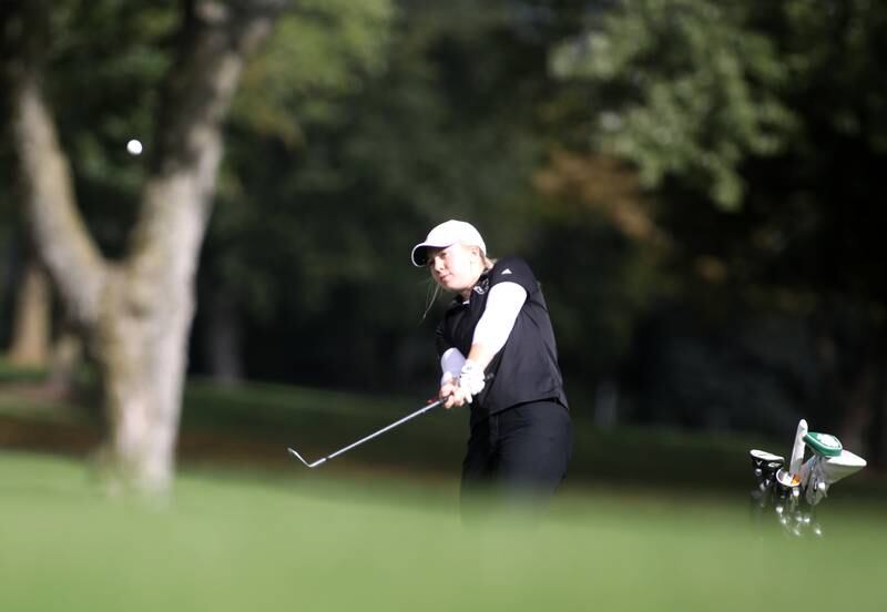 Glenbard North’s Nicole McGuire hits onto the green during the Class 2A Glenbard North Regional girls golf meet at Bloomingdale Golf Club on Thursday, Sept. 28, 2023.