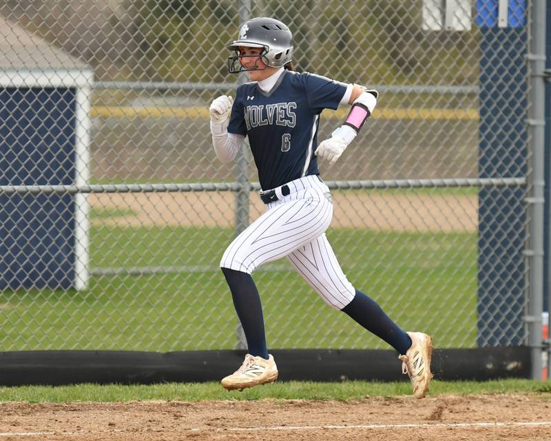 Oswego East's Danielle Stone (6) is all smile after hitting a home run during the game on Thursday April 17, 2025, while taking on Plainfield North held at Oswego East.