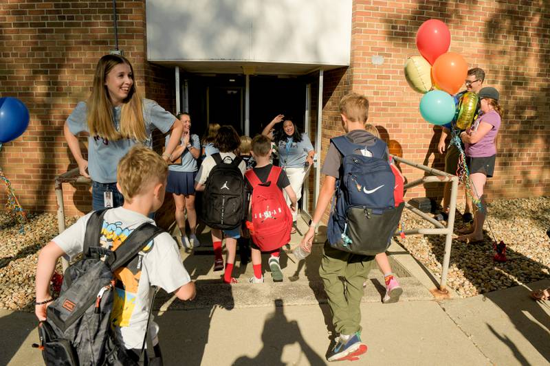 Students arrive at Davis Elementary in St. Charles for the start the 2025-2026 school year on Wednesday, Aug 13, 2025.