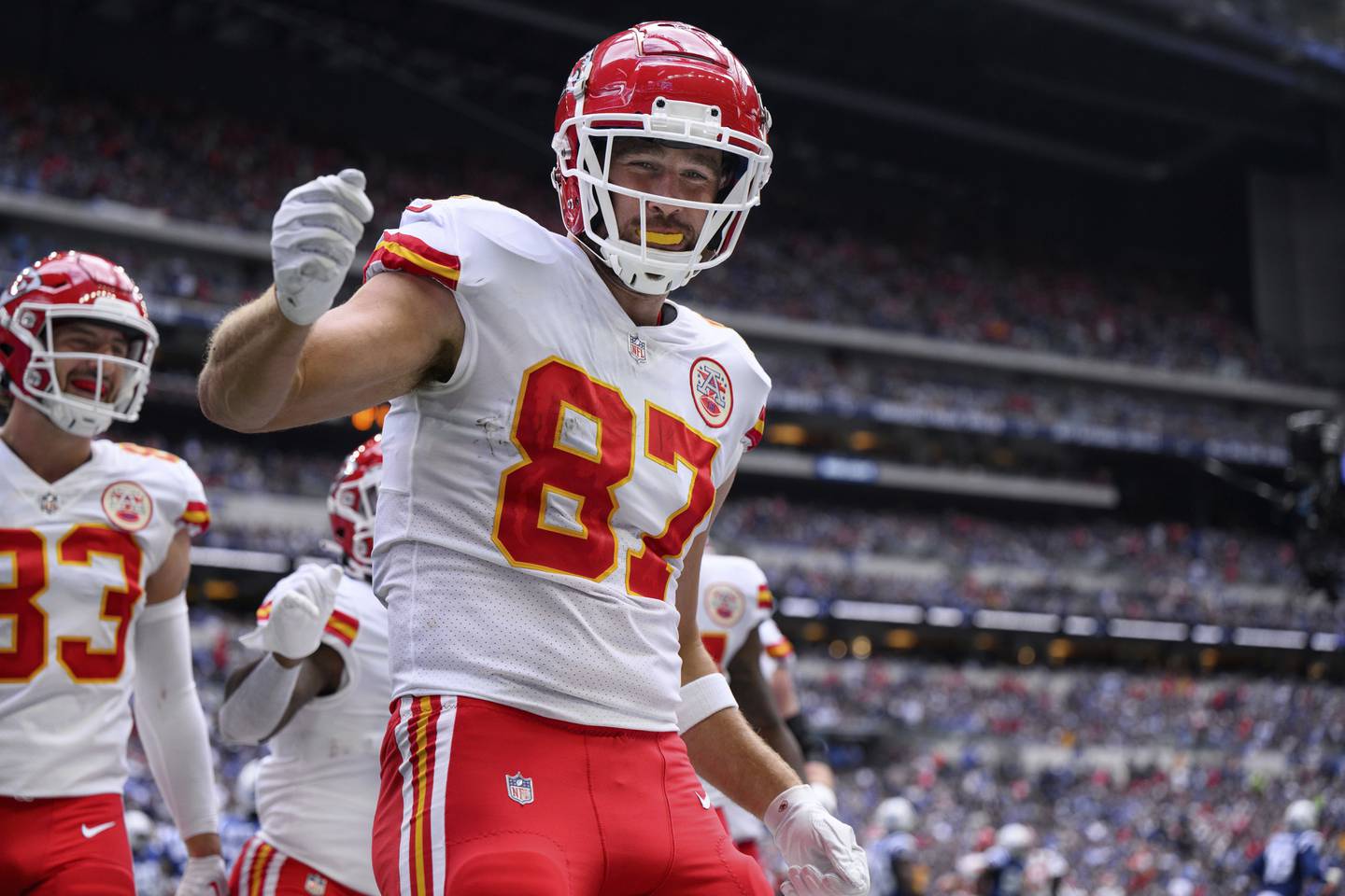 Kansas City Chiefs tight end Travis Kelce (87) celebrates a touchdown during an NFL football game against the Indianapolis Colts, Sunday, Sept. 25, 2022, in Indianapolis. (AP Photo/Zach Bolinger)