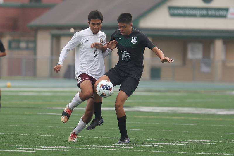 Plainfield Central’s Sebastian Chavez, right, works the ball against Morris’ Adan Mondragon on Monday, Sept. 11, 2023 in Plainfield.