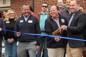 Oswego officials celebrate opening of The Reserve at Hudson Crossing North