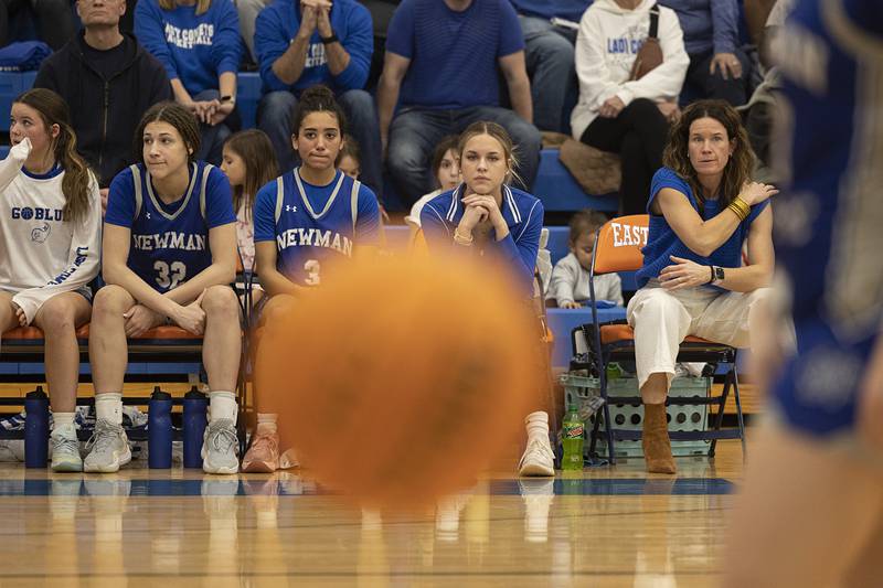 Newman’s Brooklyn Smith watches from the bench Thursday, Feb. 26, 2026, in the Class 1A sectional semifinal at Eastland. Smith was injured in a December game and had been out for the rest of the season.