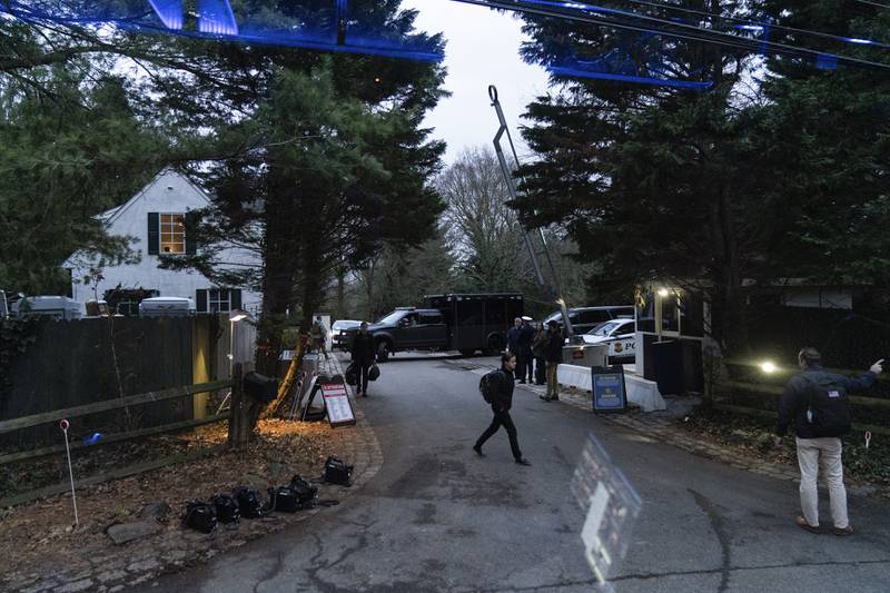 The access road to President Joe Biden's home in Wilmington, Del., is seen from the media van Friday, Jan. 13, 2023. (AP Photo/Carolyn Kaster)