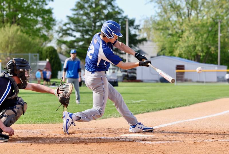 Princeton's Jack Oester connects Tuesday against Newman. The Comets won 3-2.