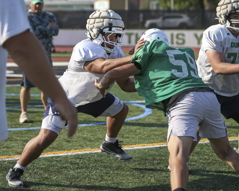 Costa Kampas goes through one on one blocking drills at York High School football practice, Thursday, Aug 14, 2025  in Elmhurst.