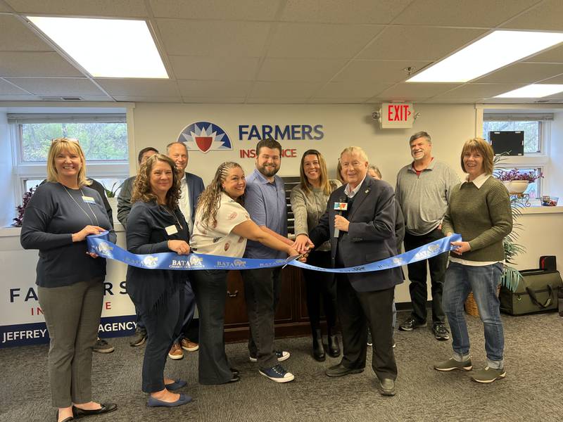 The Batavia Chamber of Commerce celebrating Jeffrey Cesario Insurance Agency's new location