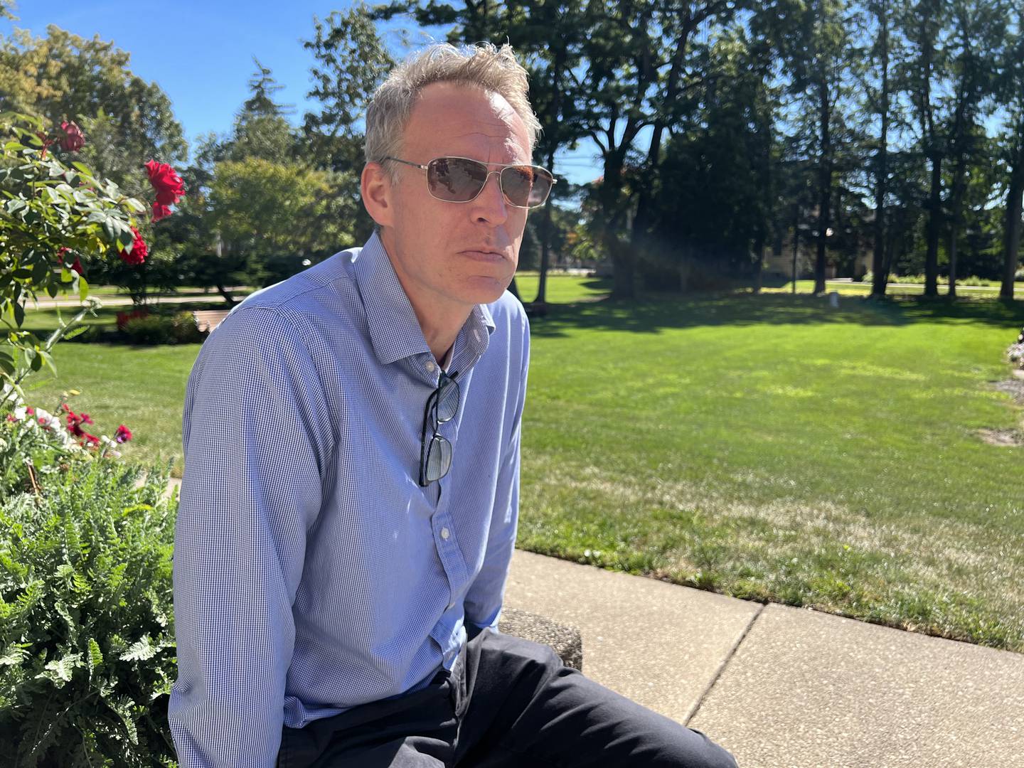 Brian Reis sits on the steps of the Ellwood House on Oct. 3 2022, the beginning of his last week after 12 years as the Executive Director.