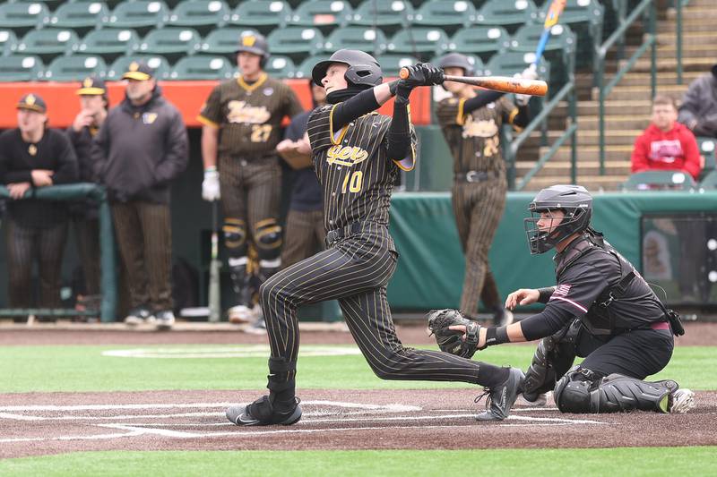Joliet West’s Keegan Schwarting drives in three runs on a bases loaded double against Lockport in the WJOL Don Ladas Memorial baseball tournament championship game on Saturday, April 4, 2026 in Joliet.