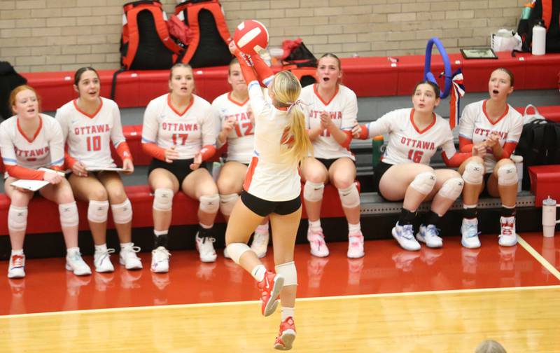 Ottawa's Ella Schmitz keeps the ball in play against L-P on Thursday, Oct. 17, 2024 in Kingman Gym at Ottawa High School.