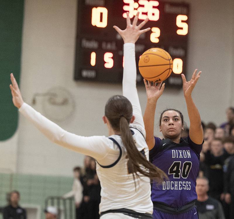Dixon's Hallie Williamson puts up a shot against Sterling Thursday, Feb. 27, 2025, during the Class 3A girls Sectional title at Rockford Boylan High School.
