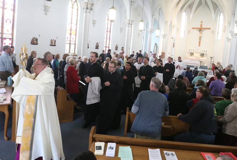 Bishop Louis Tylka leads a Eucharistic Pilgrimage on Monday, May 19, 2025 at St. Mary's Catholic Church in Utica. The Pilgrimage began in the Archdiocese of Indianapolis. It also made stops at Seneca's St. Patrick Church Queen of the Holy Rosary Shrine and St. Hyacinth Church.