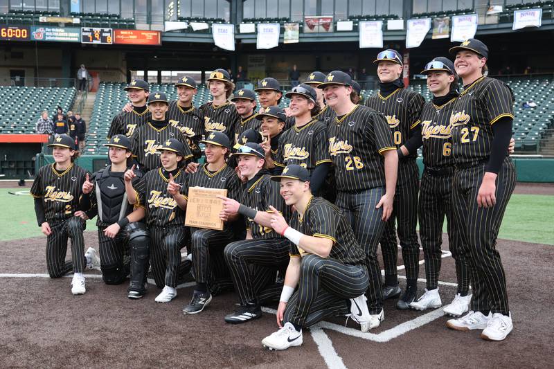 Joliet West poses with the championship plaque after beating Lockport in the WJOL Don Ladas Memorial baseball tournament championship game on Saturday, April 4, 2026 in Joliet.
