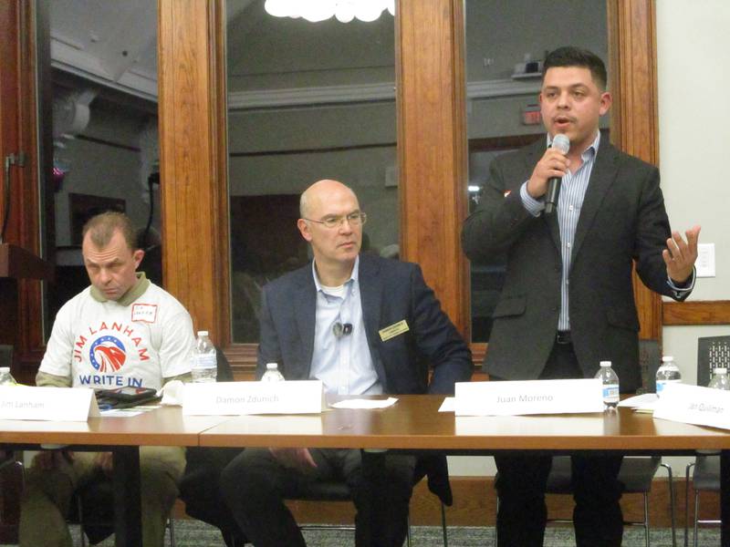 Juan Moreno makes a point during the forum for Joliet City Council candidates at the Joliet Public Library on Thursday. Feb. 19, 2025