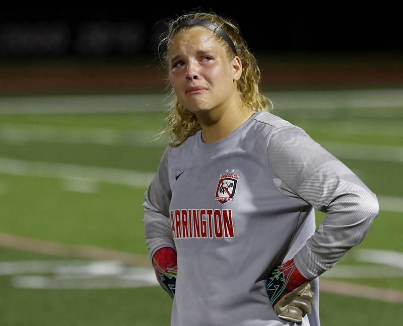 Barrington's Megan Holland tries to control her emotions as she waits to receive her medal after Barrington lost to O'Fallon in overtime in the IHSA Class 3A state championship match at North Central College in Naperville on Saturday, June 3, 2023.