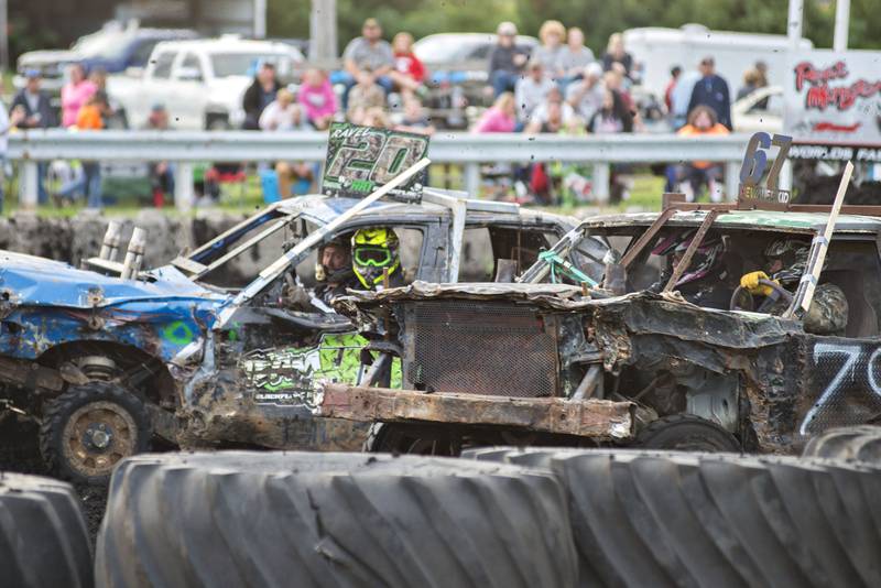 Driving the #20 car, CJ Ravel gets into it with Ron Dykeman Saturday, Sept. 4, 2021 at the World Series of Demo Derby in Morrison. 60 cars were entered into the derby that was hosted by Peat Monster.