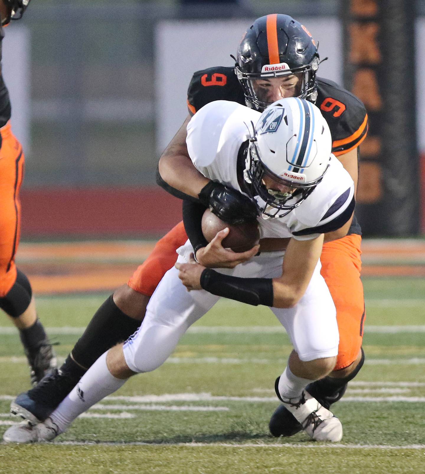 DeKalb's Christian Lorenzo sacks Plainfield South quarterback Connor Folliard during their game Friday, Sept. 3, 2021 at DeKalb High School.