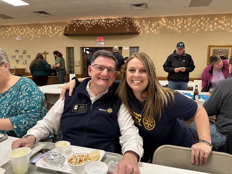 Rotary District Governor Dave Emerick and Dixon Rotary Club President Mary Oros are shown at the club's shrimp boil and chili bowl March 9 in Dixon.