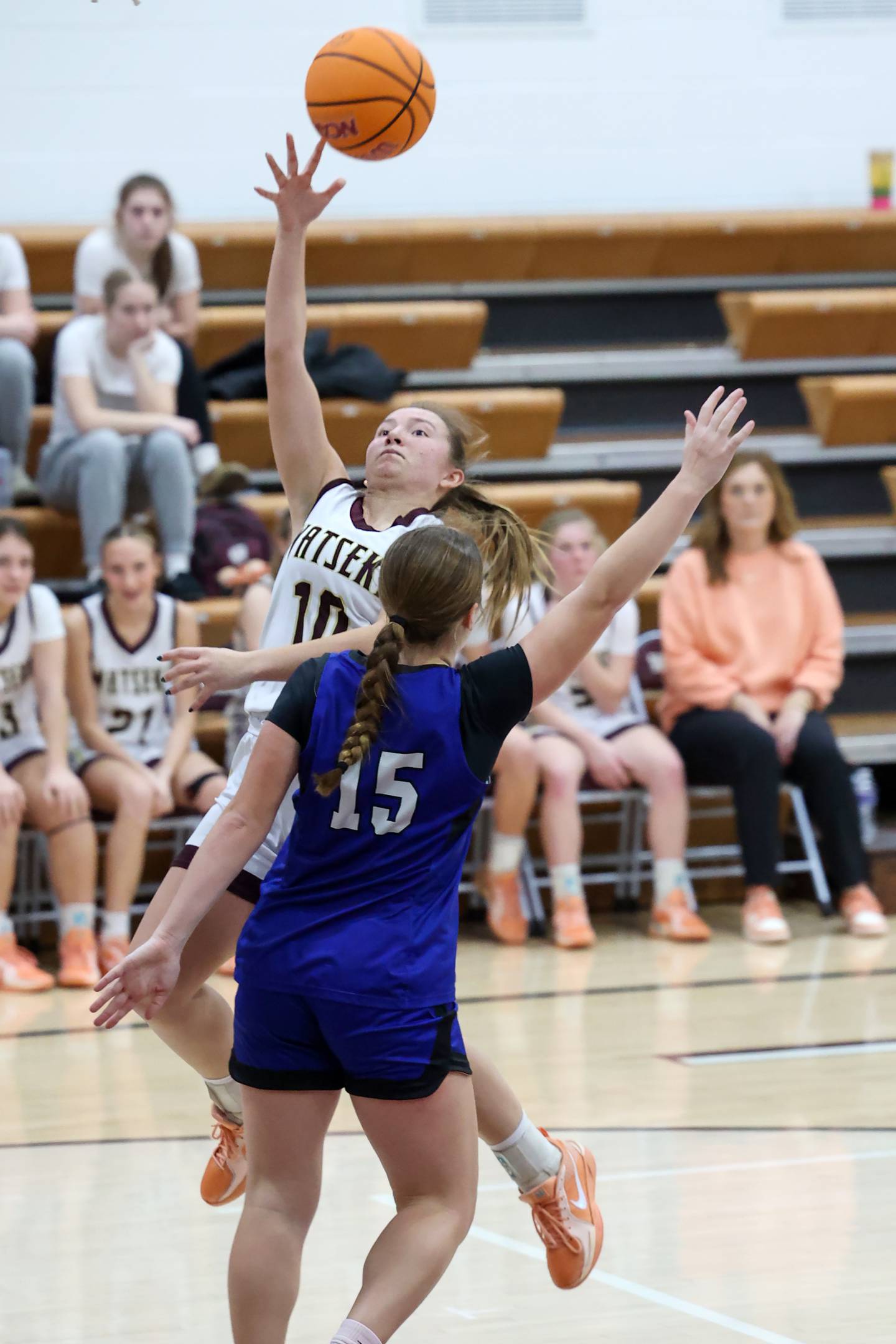 Watseka-Milford's Christa Holohan goes for a layup against Clifton Central's Lia Prairie during the Warriors' 60-49 victory over Clifton Central on Saturday, Jan. 10, 2026.