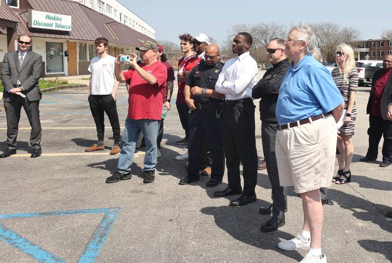 Members of the public, including former mayor Jerry Smith, along with DeKalb city officials were on hand for a special meeting of the DeKalb City Council Monday, May 9, 2022, in the parking lot of the former Hillcrest Shopping Center. The meeting was held to kick off the demolition process of the strip mall on Hillcrest Drive which will begin Tuesday morning.